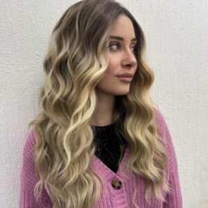 Wavy rooted blonde synthetic wig